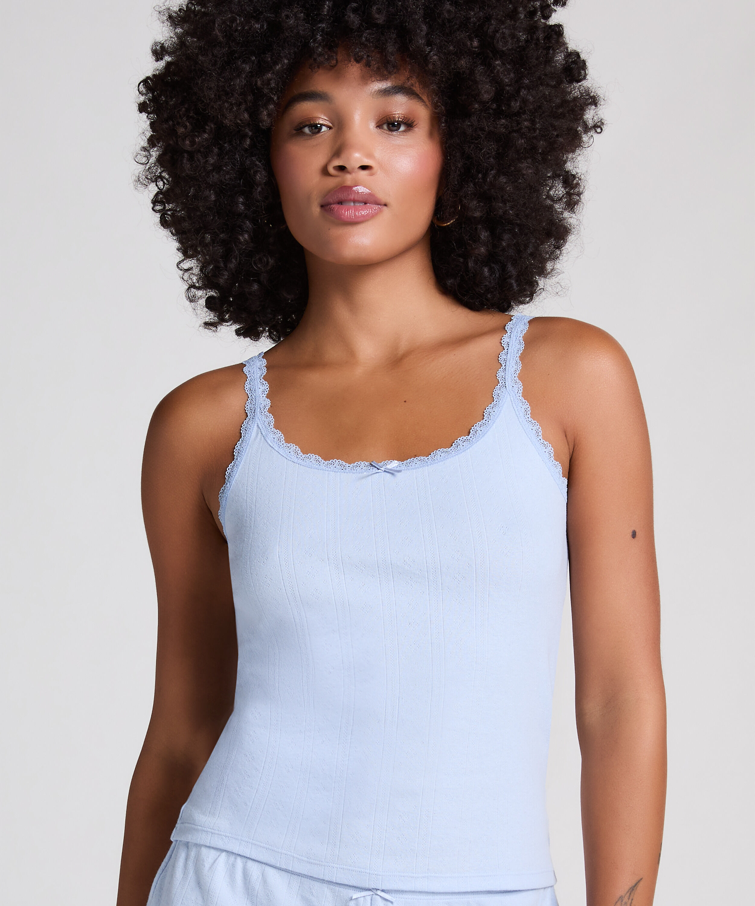 Camiseta sin mangas en pointelle